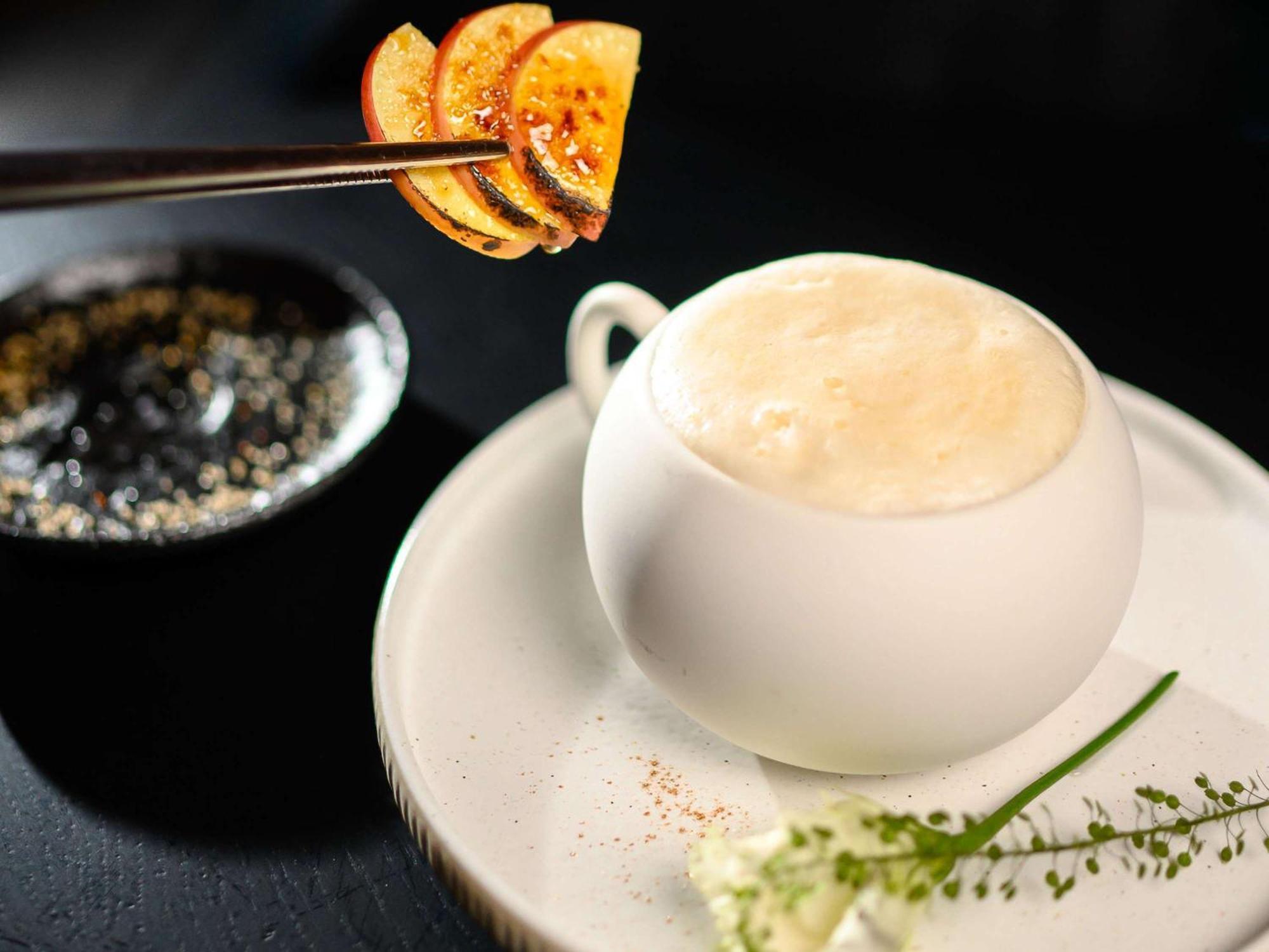 Pullman Riga Old Town Hotel Екстериор снимка A cup of coffee with a slice of orange